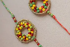 Crochet Rakhi -⚬- Handmade Rainbow Threads Crochet Rakhi (Set of 2)