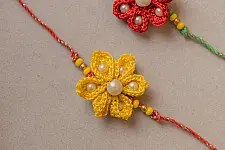 Crochet Rakhi -⚬- Handmade Red and Yellow Crochet Rakhi (Set of 2)