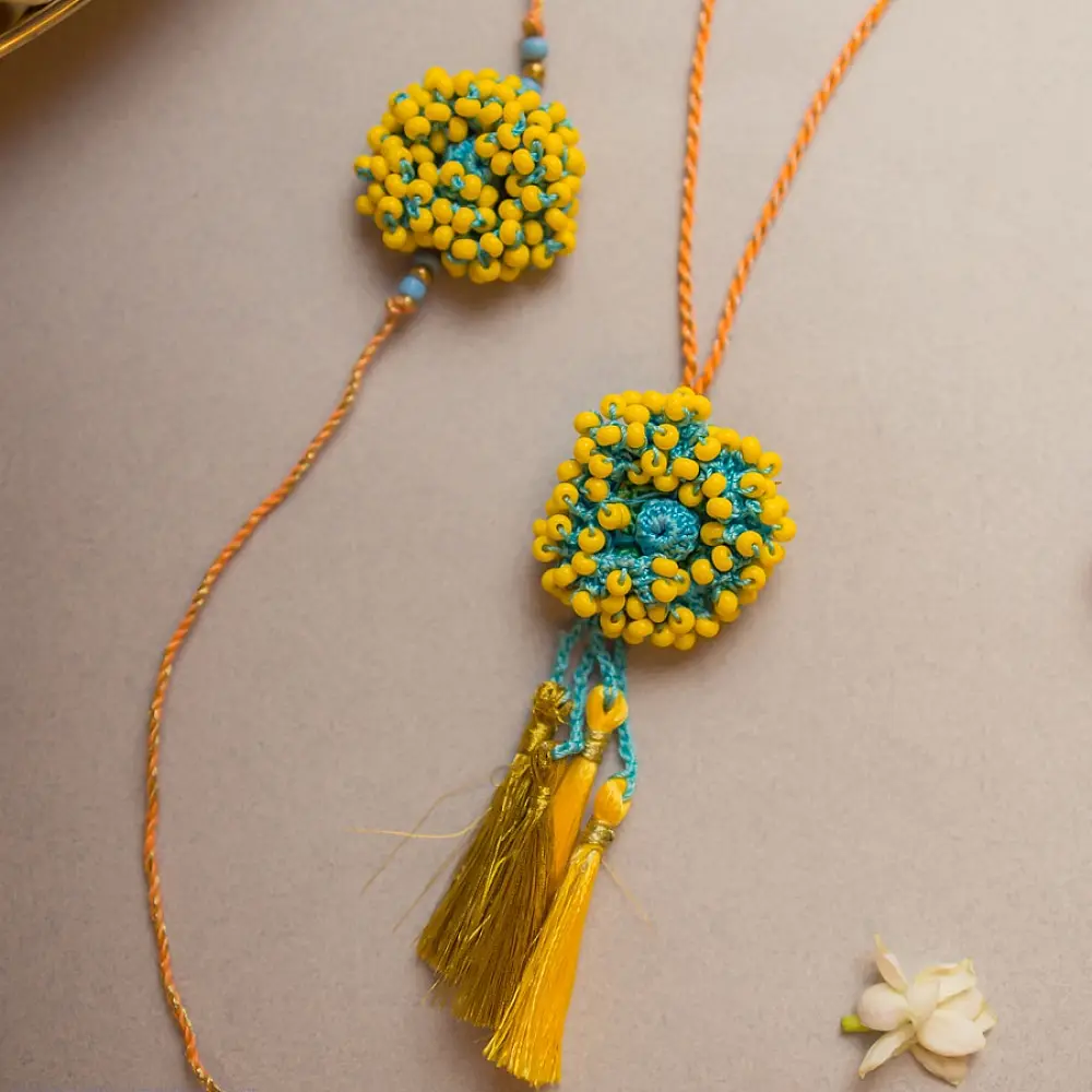 shop Yellow Coral Crochet Rakhi & Lumba Set (Set of 2)
