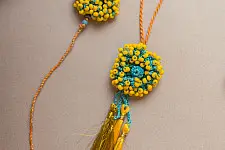 Crochet Rakhi -⚬- Yellow Coral Crochet Rakhi & Lumba Set (Set of 2)