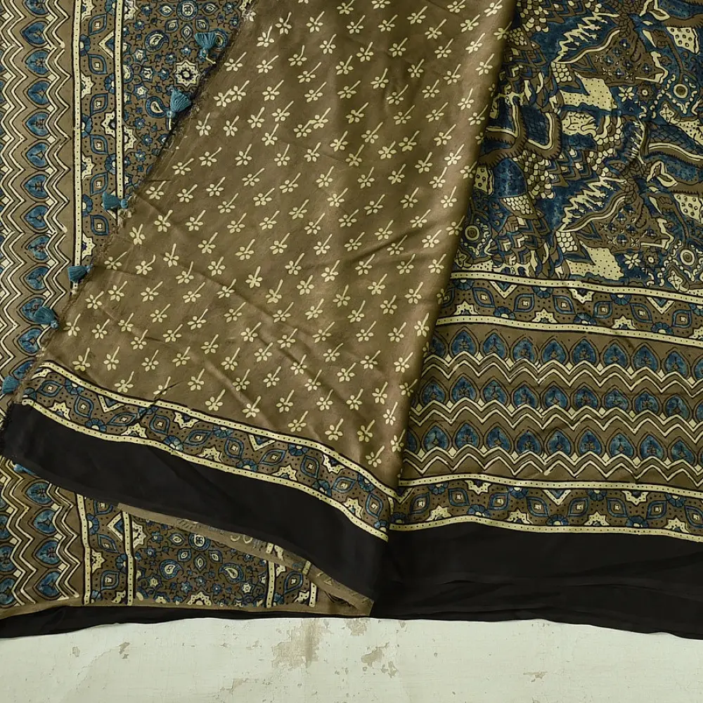 moss green mustard gold ajrakh modal silk saree hand block printed floral sprig body traditional geometric borders ethnic wear sustainable luxury natural dyed with tassels