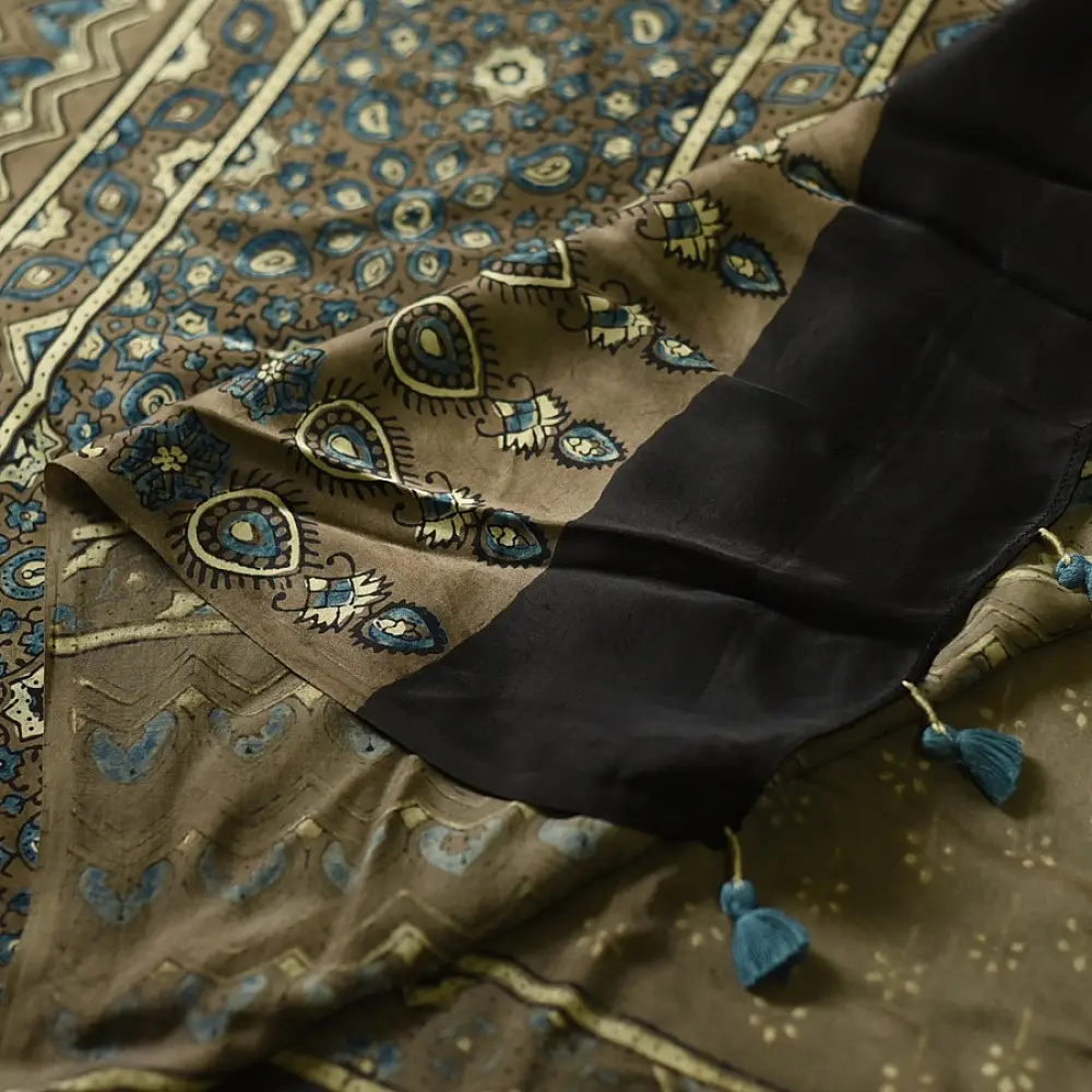 moss green mustard gold ajrakh modal silk saree hand block printed floral sprig body traditional geometric borders ethnic wear sustainable luxury natural dyed with tassels