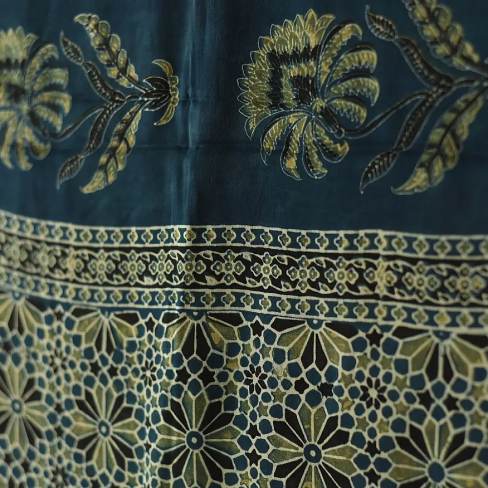 deep indigo blue moss green ajrakh modal silk dupatta hand block printed floral buta motif body ornate star medallion pallu traditional mihrab arched detail wedding festive wear sustainable luxury natural dyed with tassels