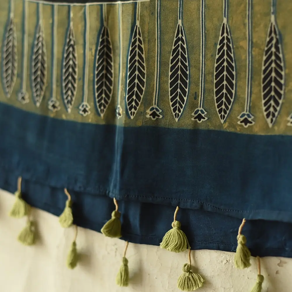 deep indigo blue moss green ajrakh modal silk dupatta hand block printed floral buta motif body ornate star medallion pallu traditional mihrab arched detail wedding festive wear sustainable luxury natural dyed with tassels