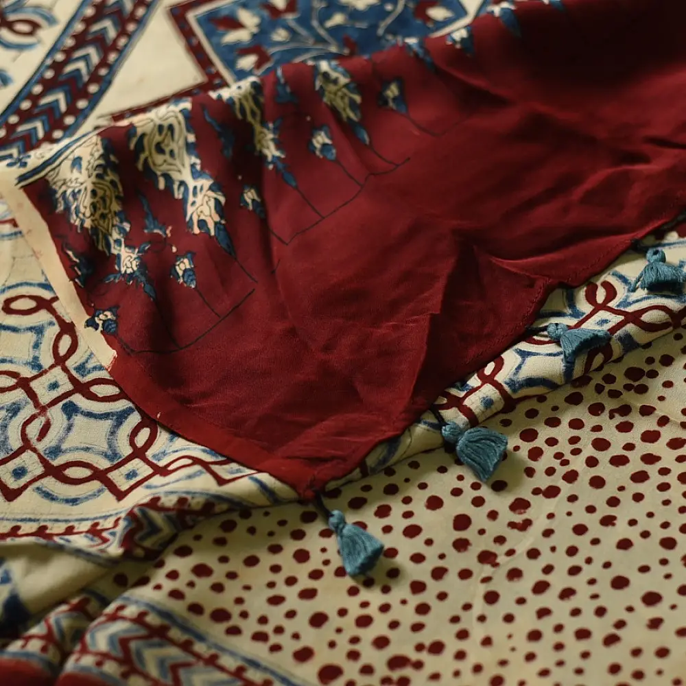 cream indigo blue madder red ajrakh cotton saree hand block printed floral vine pallu interlocking circular motifs traditional ethnic wear sustainable fashion natural dyed