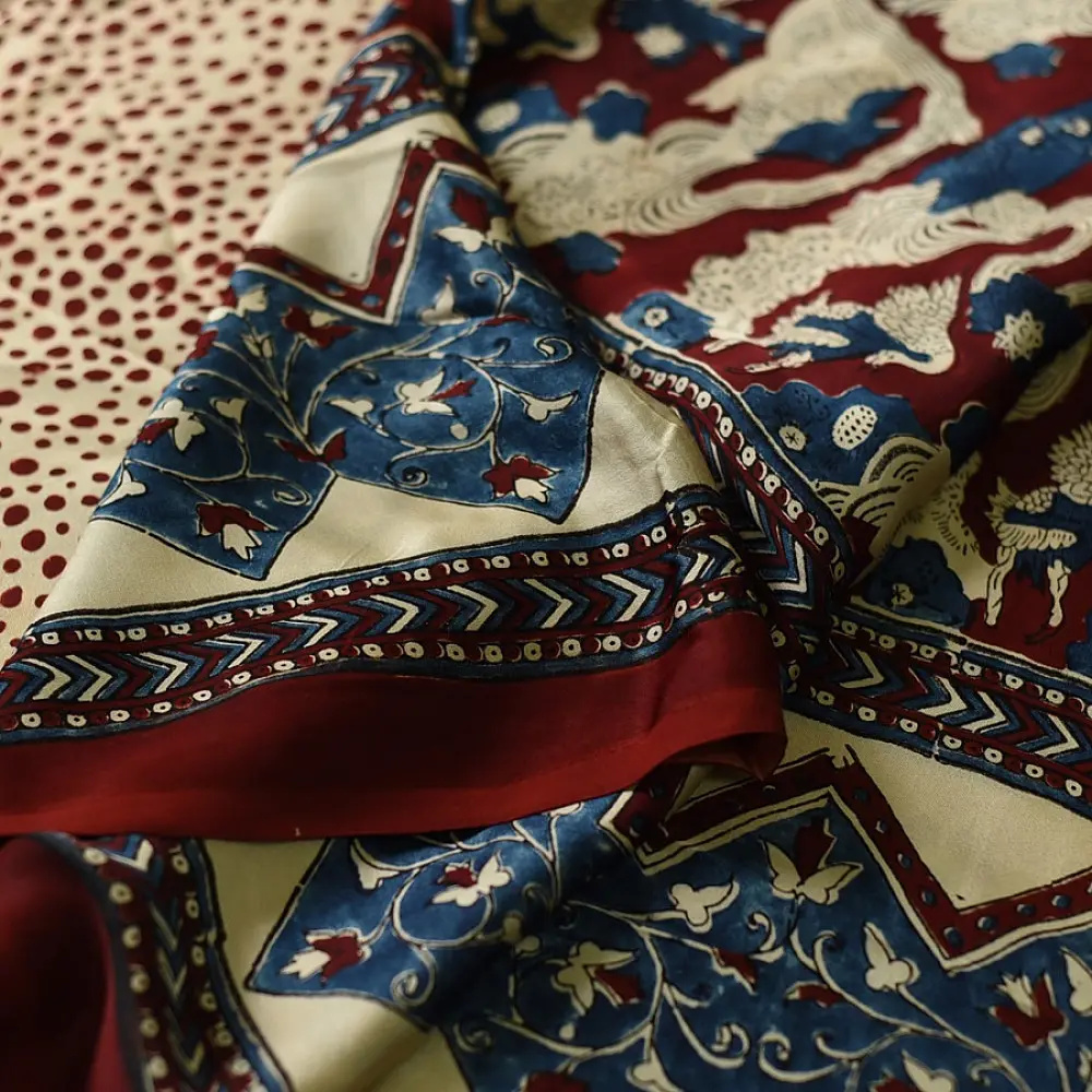 cream indigo blue madder red ajrakh cotton saree hand block printed floral vine pallu interlocking circular motifs traditional ethnic wear sustainable fashion natural dyed