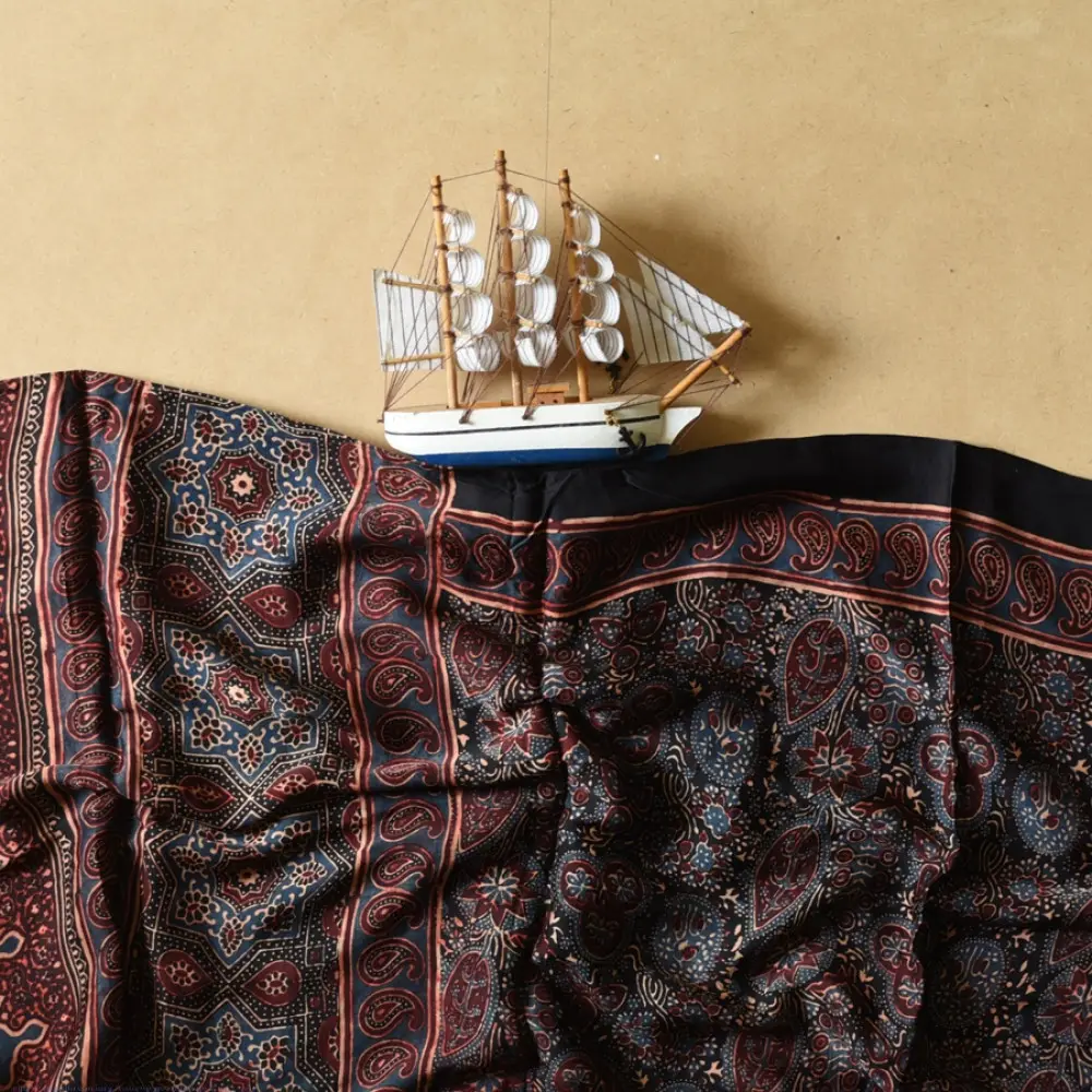 black madder red indigo blue ajrakh modal silk dupatta hand block printed floral mandala jaal body ornate paisley kalka pallu traditional mihrab arched detail wedding festive wear sustainable luxury natural dyed with tassels