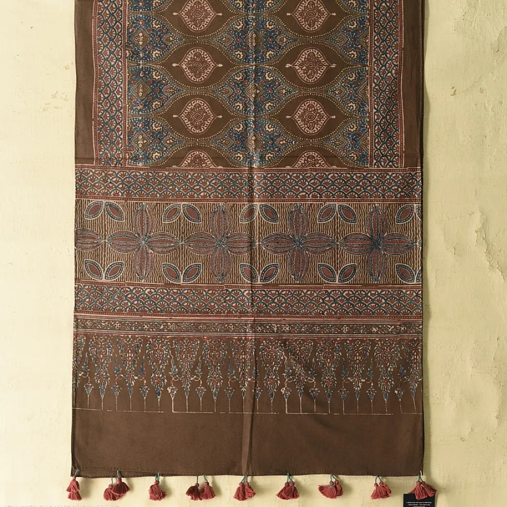 chocolate brown indigo blue madder red ajrakh cotton stole hand block printed floral medallion body ornate petal motif border traditional mihrab arched detail artisanal scarf sustainable fashion natural dyed with tassels