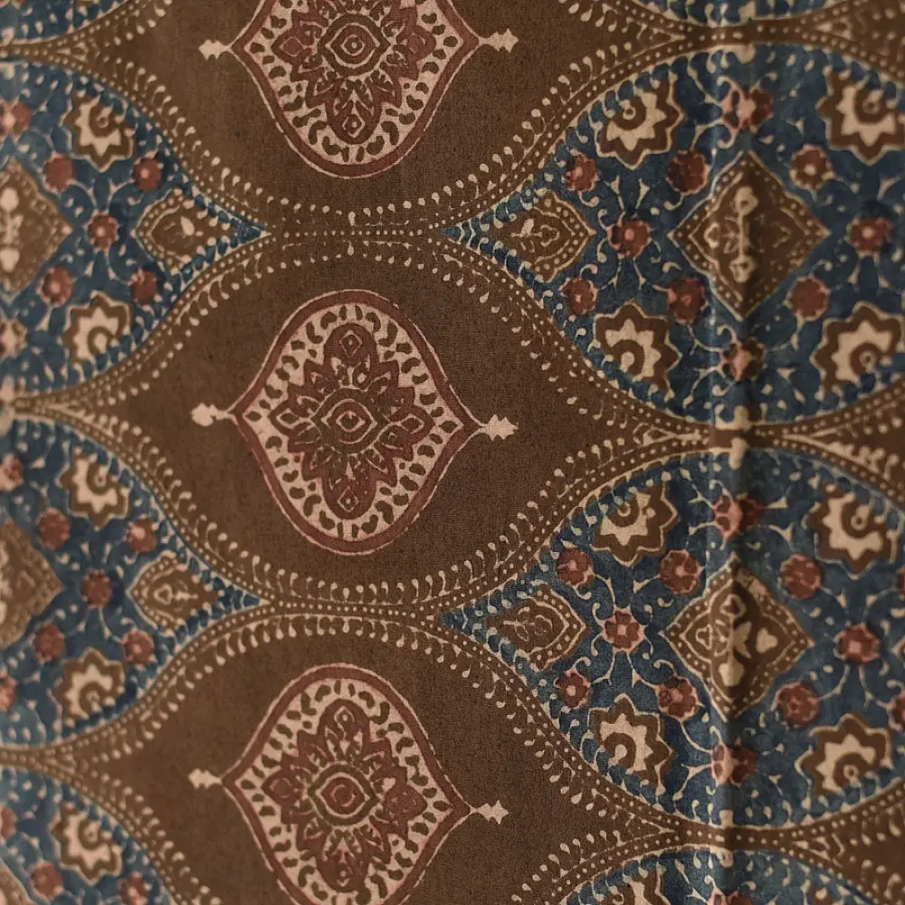 chocolate brown indigo blue madder red ajrakh cotton stole hand block printed floral medallion body ornate petal motif border traditional mihrab arched detail artisanal scarf sustainable fashion natural dyed with tassels