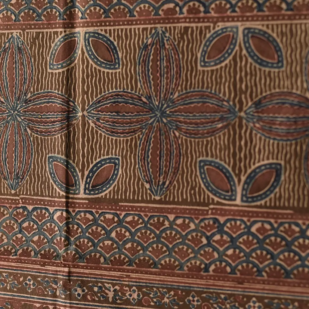 chocolate brown indigo blue madder red ajrakh cotton stole hand block printed floral medallion body ornate petal motif border traditional mihrab arched detail artisanal scarf sustainable fashion natural dyed with tassels