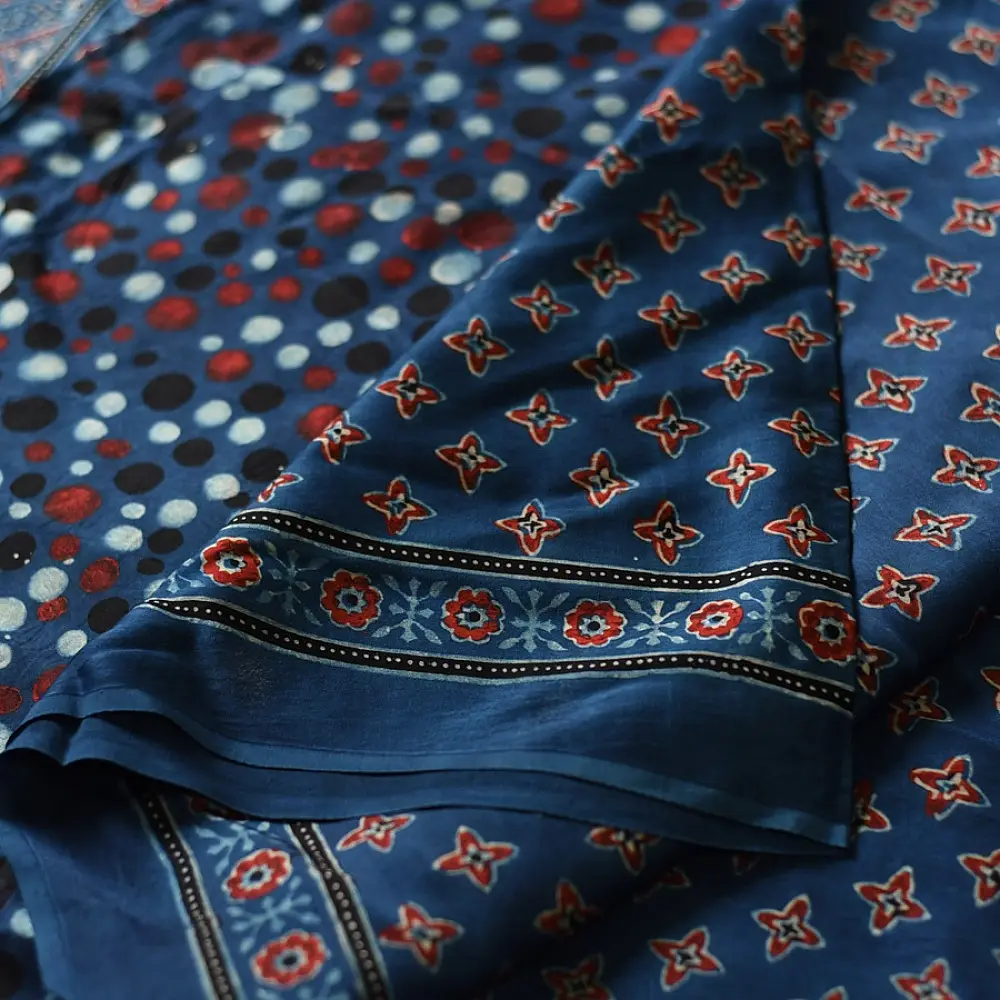 deep indigo blue madder red ajrakh modal silk saree hand block printed geometric buti body bundi medley polka dot pallu traditional ethnic wear sustainable luxury natural dyed with tassels