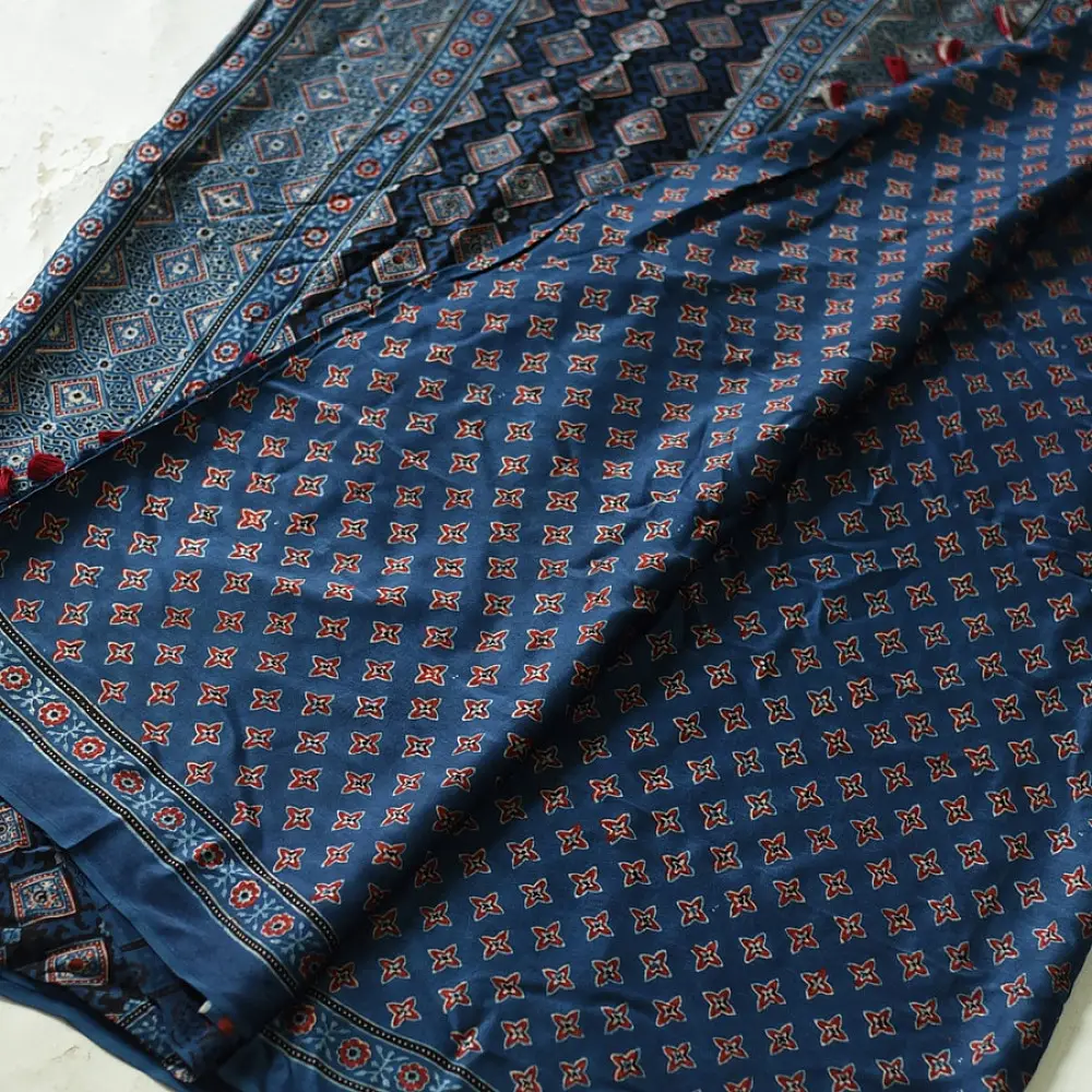 deep indigo blue madder red ajrakh modal silk saree hand block printed geometric buti body bundi medley polka dot pallu traditional ethnic wear sustainable luxury natural dyed with tassels