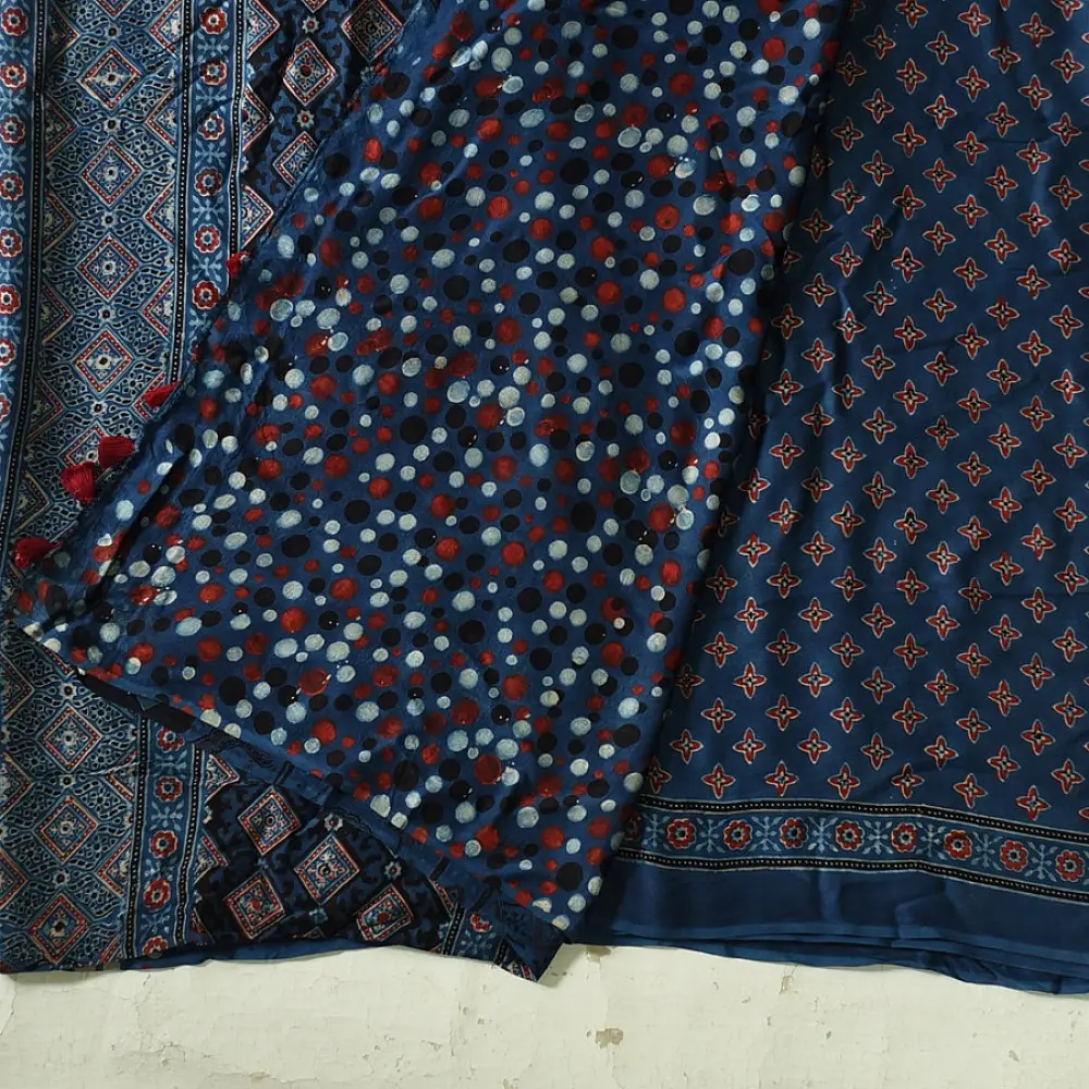 deep indigo blue madder red ajrakh modal silk saree hand block printed geometric buti body bundi medley polka dot pallu traditional ethnic wear sustainable luxury natural dyed with tassels