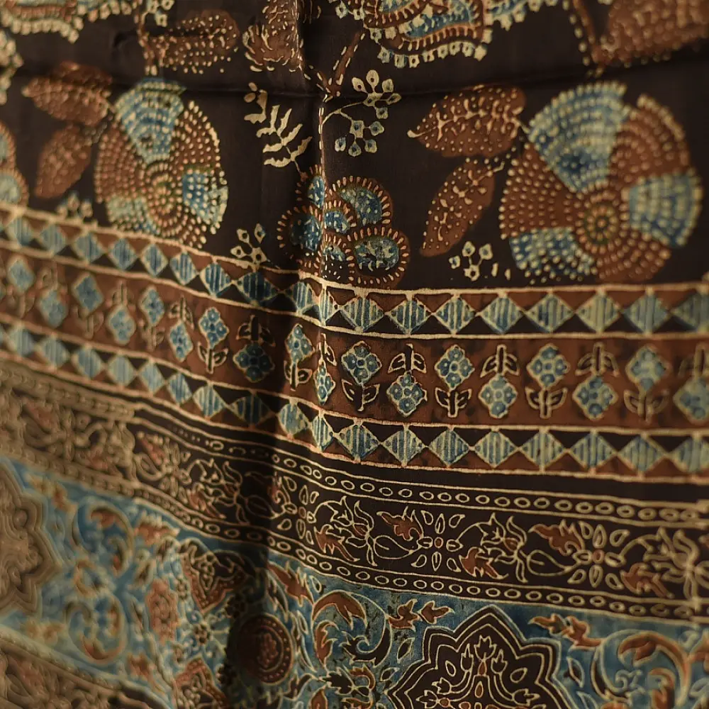 chocolate brown indigo teal ajrakh modal silk dupatta hand block printed floral buta body ornate circular mandala pallu traditional mihrab arched detail wedding festive wear sustainable luxury natural dyed with tassels
