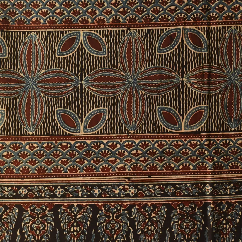 indigo blue madder red ajrakh cotton stole hand block printed floral mandala jaal body ornate petal motif border traditional mihrab arched detail artisanal scarf sustainable fashion natural dyed with tassels