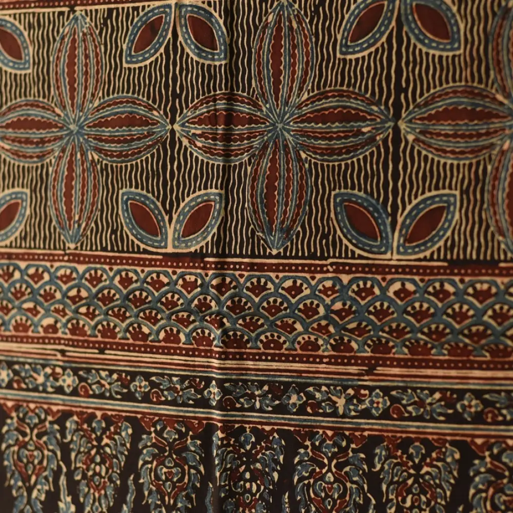 indigo blue madder red ajrakh cotton stole hand block printed floral mandala jaal body ornate petal motif border traditional mihrab arched detail artisanal scarf sustainable fashion natural dyed with tassels