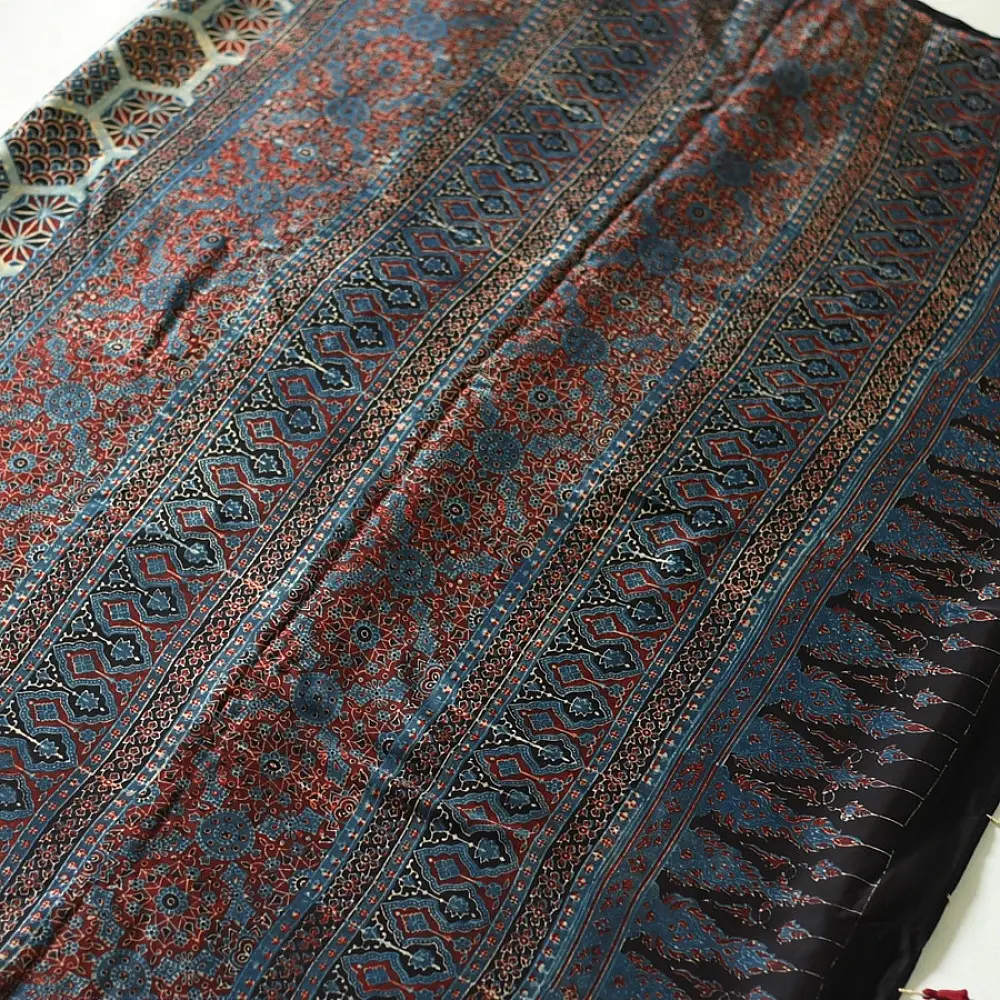 deep indigo blue madder red ajrakh saree hand block printed hexagonal honeycomb beehive jaal ornate floral pallu traditional ethnic wear sustainable fashion natural dyed with tassels