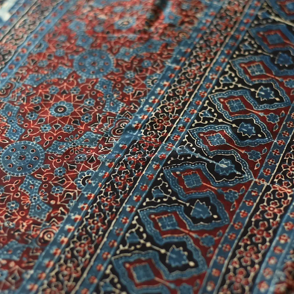 deep indigo blue madder red ajrakh saree hand block printed hexagonal honeycomb beehive jaal ornate floral pallu traditional ethnic wear sustainable fashion natural dyed with tassels