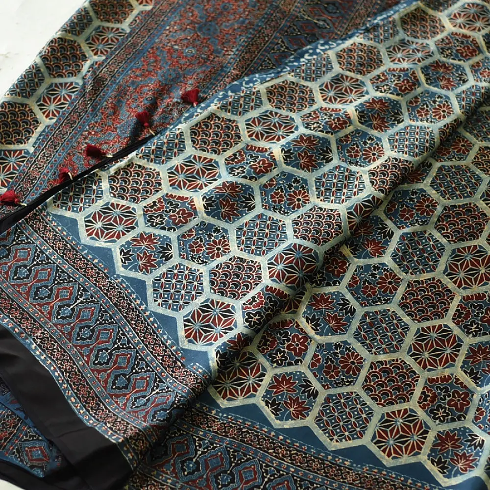 deep indigo blue madder red ajrakh saree hand block printed hexagonal honeycomb beehive jaal ornate floral pallu traditional ethnic wear sustainable fashion natural dyed with tassels