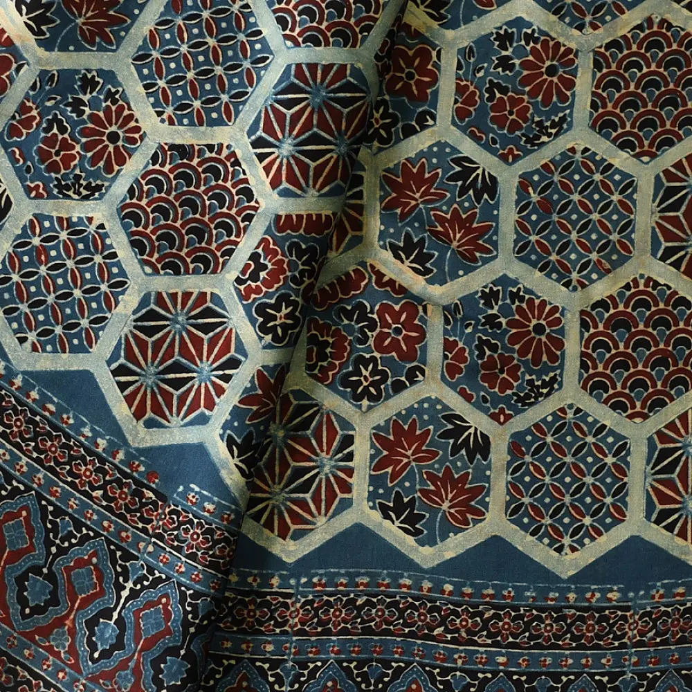 deep indigo blue madder red ajrakh saree hand block printed hexagonal honeycomb beehive jaal ornate floral pallu traditional ethnic wear sustainable fashion natural dyed with tassels