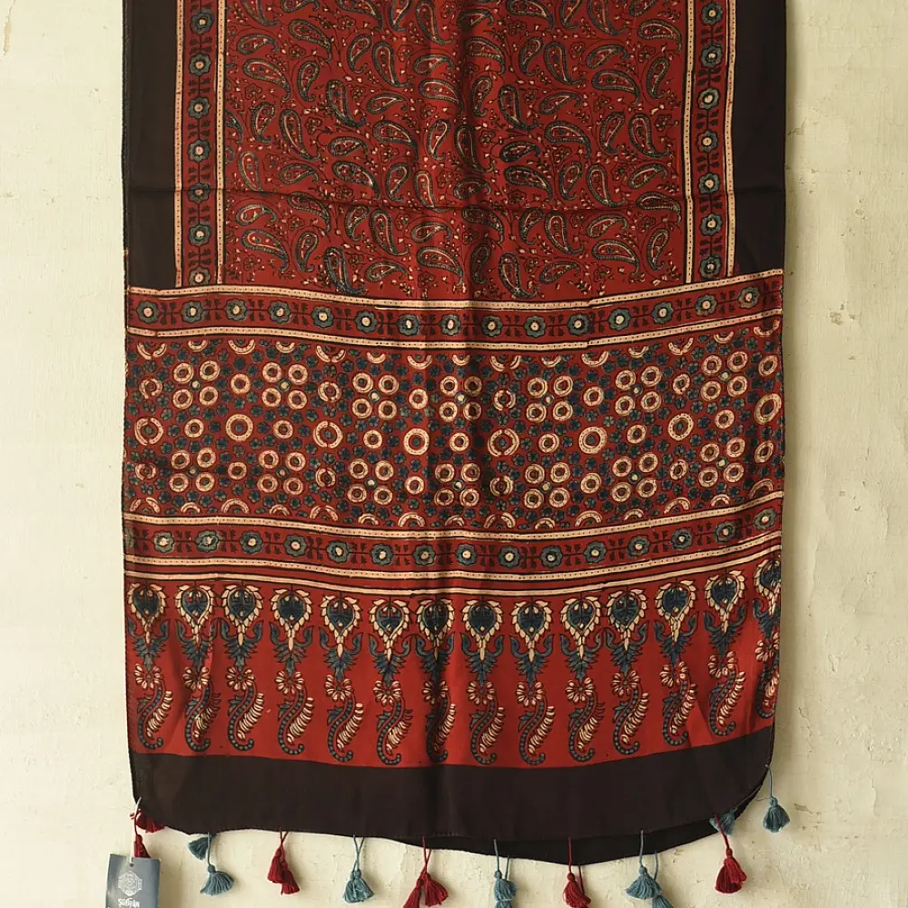 madder red indigo blue ajrakh modal silk dupatta hand block printed paisley kalka jaal body ornate circular bundi medallion pallu traditional mihrab arched detail wedding festive wear sustainable luxury natural dyed with tassels