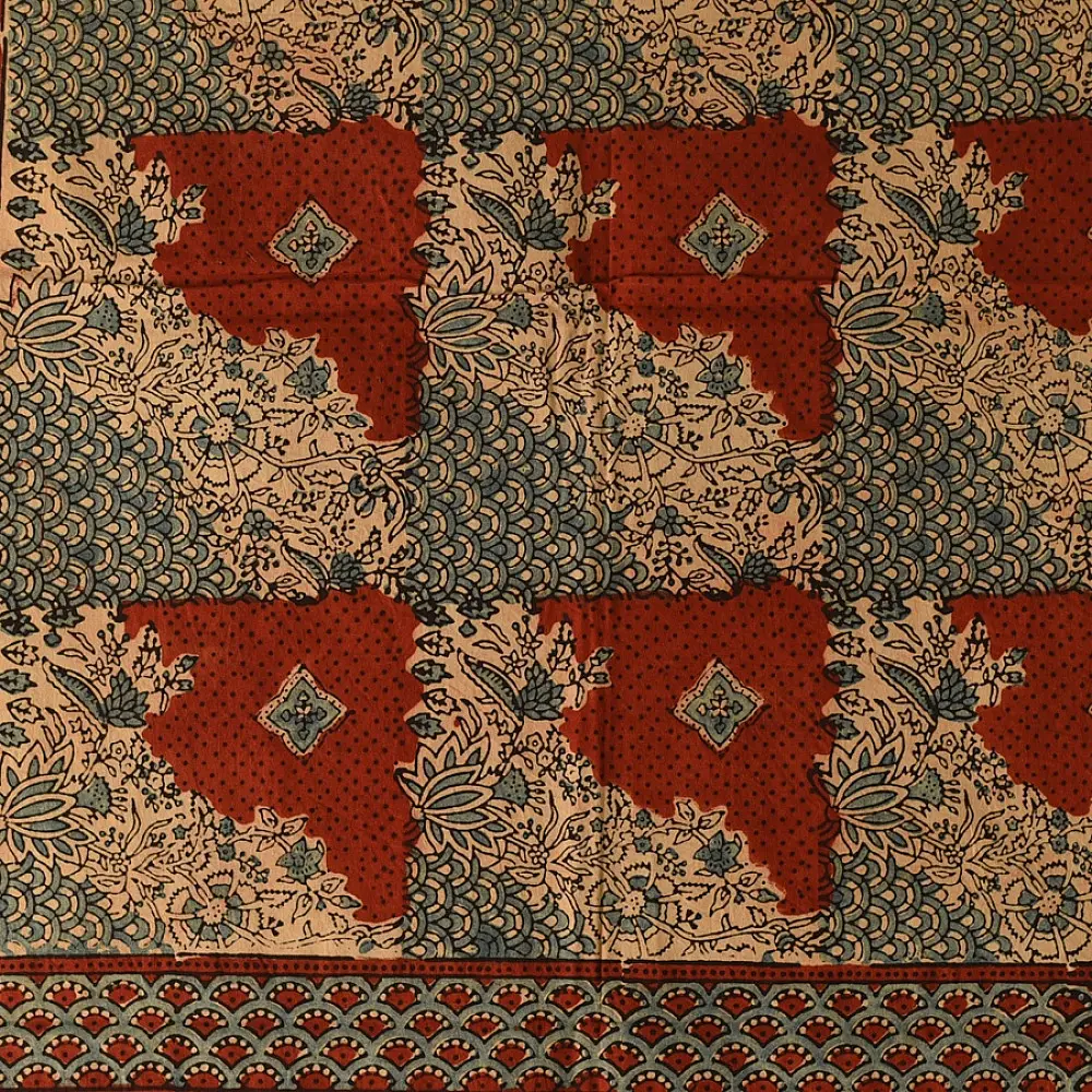 madder red indigo blue ajrakh cotton stole hand block printed checkerboard patchwork body ornate interlocking circular motifs mihrab arched border traditional artisanal scarf sustainable fashion natural dyed with tassels