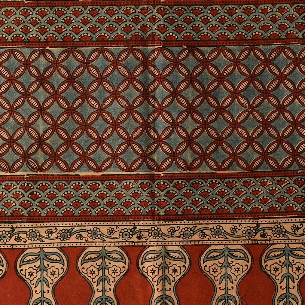 madder red indigo blue ajrakh cotton stole hand block printed checkerboard patchwork body ornate interlocking circular motifs mihrab arched border traditional artisanal scarf sustainable fashion natural dyed with tassels