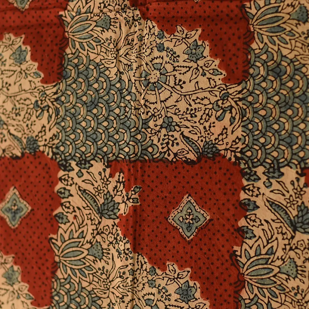 madder red indigo blue ajrakh cotton stole hand block printed checkerboard patchwork body ornate interlocking circular motifs mihrab arched border traditional artisanal scarf sustainable fashion natural dyed with tassels