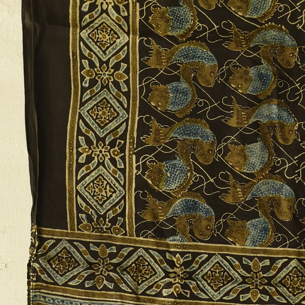chocolate brown indigo teal ajrakh modal silk dupatta hand block printed floral vine jaal body ornate geometric lozenge pallu traditional mihrab arched detail wedding festive wear sustainable luxury natural dyed with tassels Fish Motif