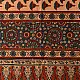 terracotta madder red indigo blue ajrakh cotton stole hand block printed floral sprig body ornate circular mandala border traditional mihrab arched detail artisanal scarf sustainable fashion natural dyed with tassels