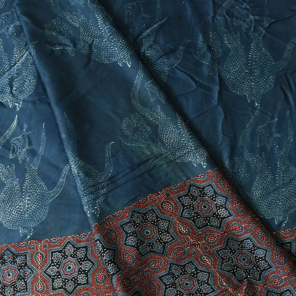 deep indigo blue madder red ajrakh modal silk saree hand block printed octagonal star jaal ornate floral mandala pallu traditional ethnic wear sustainable luxury natural dyed with tassels