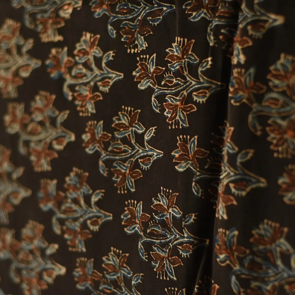 chocolate brown indigo blue ajrakh modal silk dupatta hand block printed jhar floral sprig jaal body ornate circular medallion pallu traditional mihrab arched detail wedding festive wear sustainable luxury natural dyed with tassels