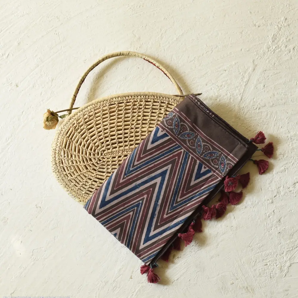 chocolate brown indigo blue madder red ajrakh cotton stole hand block printed zigzag leheriya body ornate eight-pointed star motif border traditional mihrab arched detail artisanal scarf sustainable fashion natural dyed with tassels