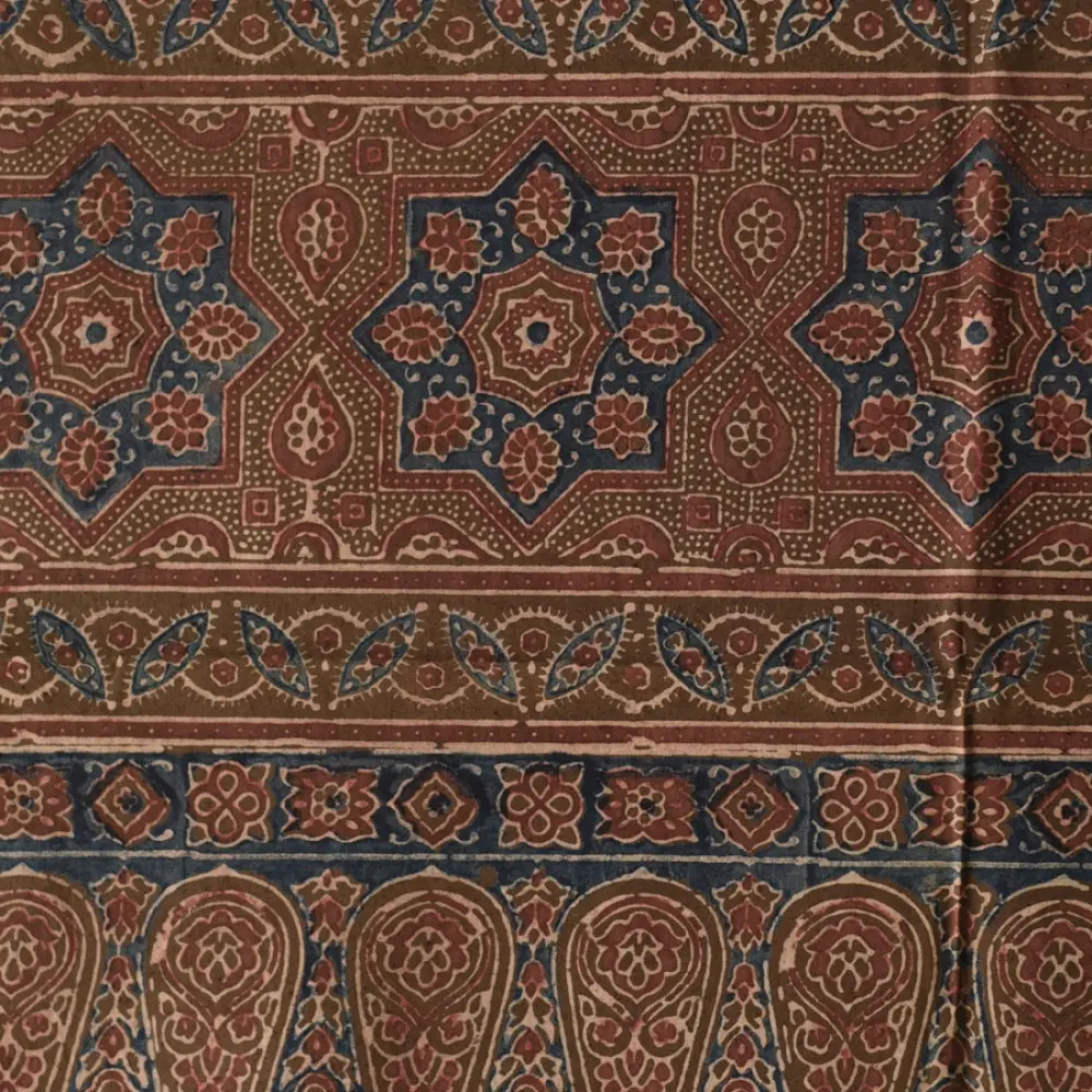 chocolate brown indigo blue madder red ajrakh cotton stole hand block printed zigzag leheriya body ornate eight-pointed star motif border traditional mihrab arched detail artisanal scarf sustainable fashion natural dyed with tassels
