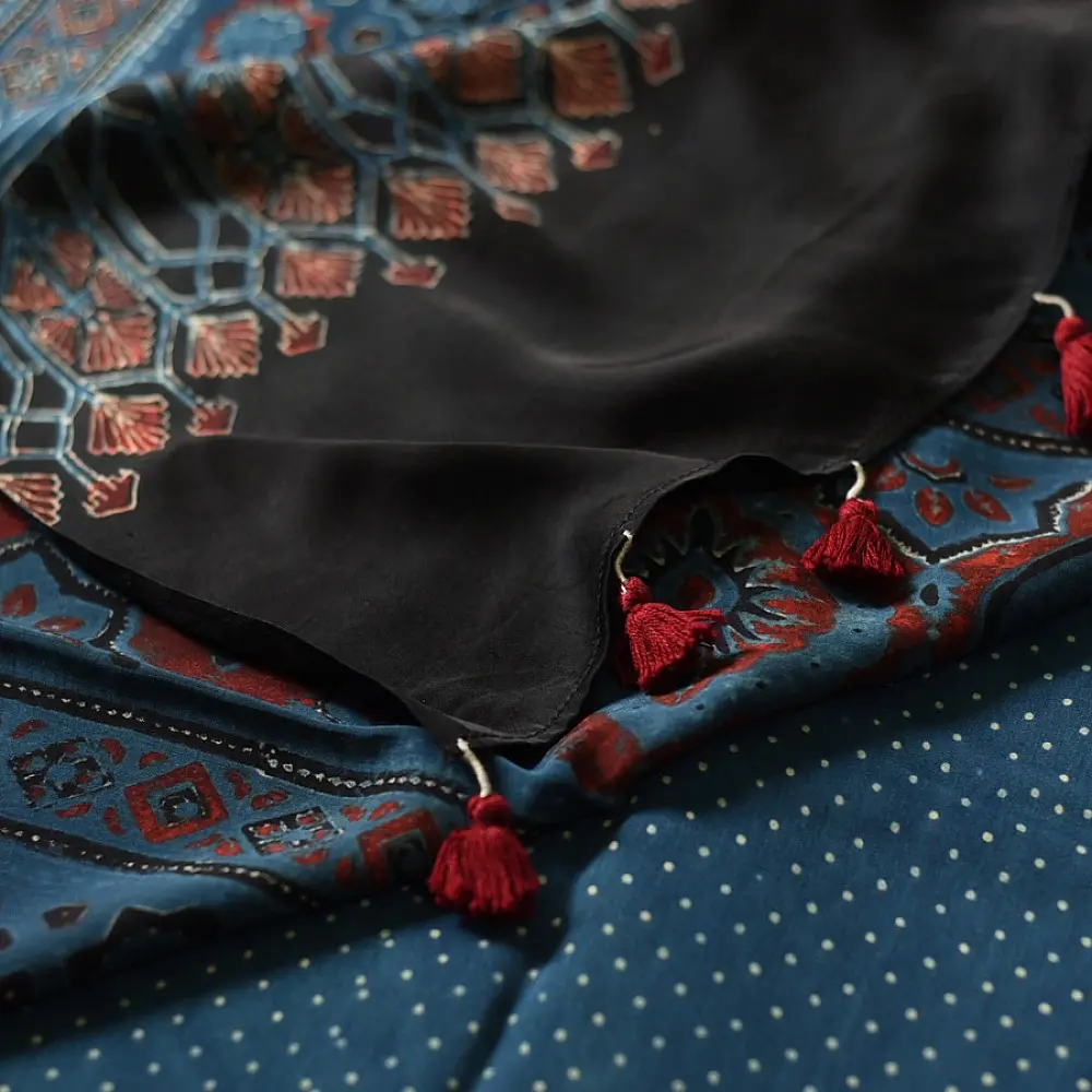 deep indigo blue ajrakh modal silk saree hand block printed minimal bundi tiny dot body ornate floral mandala pallu traditional ethnic wear sustainable luxury natural dyed