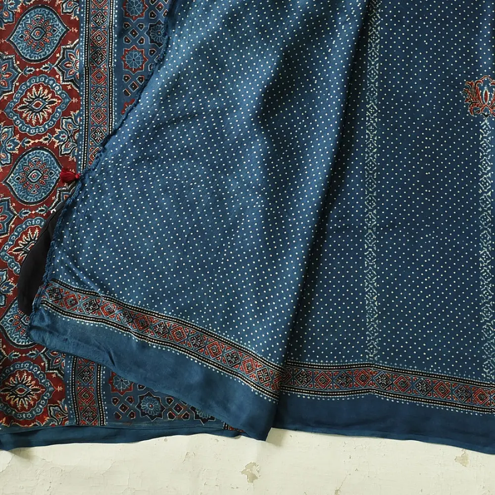 deep indigo blue ajrakh modal silk saree hand block printed minimal bundi tiny dot body ornate floral mandala pallu traditional ethnic wear sustainable luxury natural dyed