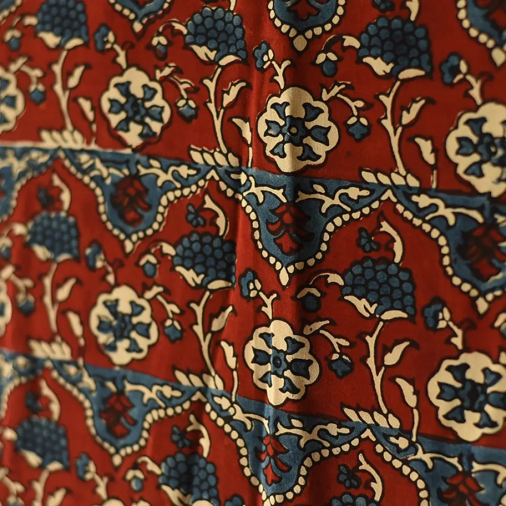 madder red indigo blue ajrakh modal silk dupatta hand block printed floral vine jaal body ornate zigzag leheriya pallu traditional mihrab arched detail wedding festive wear sustainable luxury natural dyed with tassels