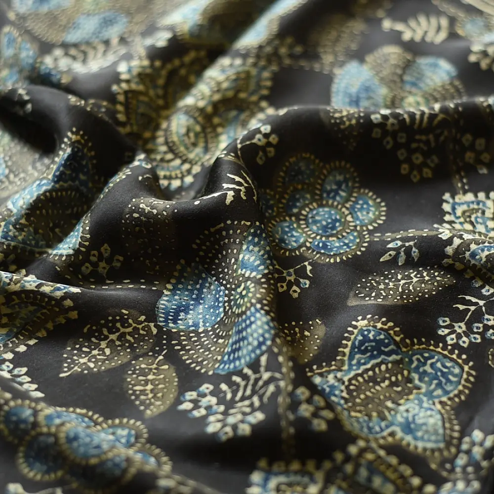 chocolate brown indigo blue ajrakh modal silk dupatta hand block printed floral vine jaal body ornate circular medallion pallu traditional mihrab arched detail wedding festive wear sustainable luxury natural dyed with tassels