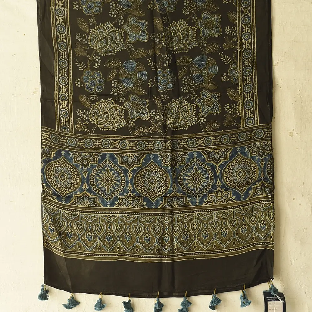 chocolate brown indigo blue ajrakh modal silk dupatta hand block printed floral vine jaal body ornate circular medallion pallu traditional mihrab arched detail wedding festive wear sustainable luxury natural dyed with tassels