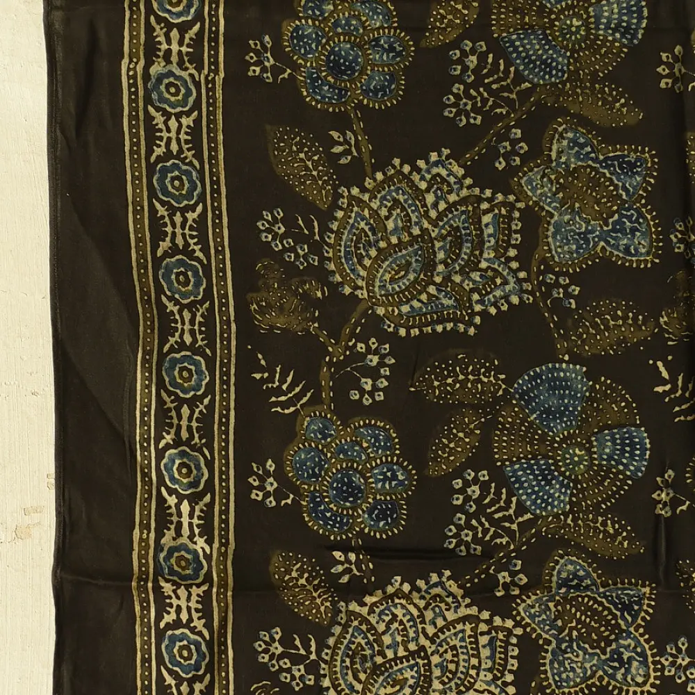 chocolate brown indigo blue ajrakh modal silk dupatta hand block printed floral vine jaal body ornate circular medallion pallu traditional mihrab arched detail wedding festive wear sustainable luxury natural dyed with tassels