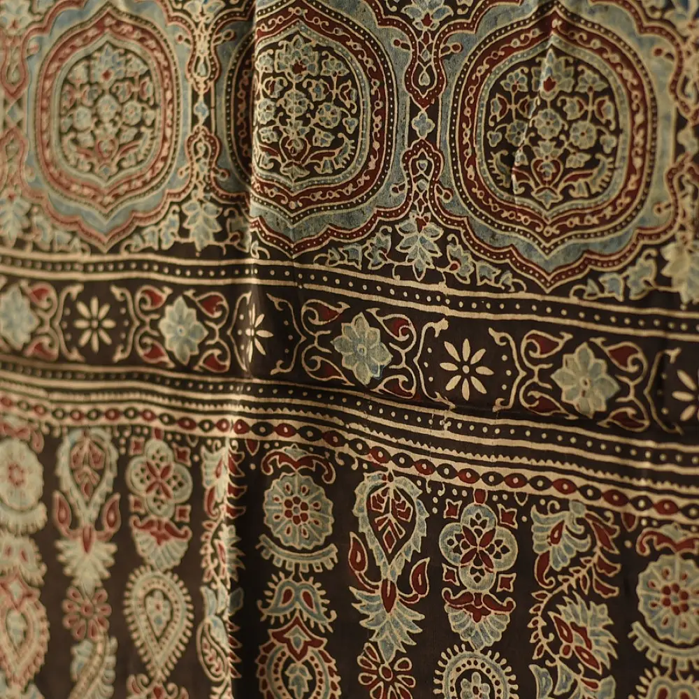 chocolate brown indigo madder red ajrakh modal silk dupatta hand block printed floral medallion jaal body ornate circular medallion pallu traditional mihrab arched detail wedding festive wear sustainable luxury natural dyed with tassels