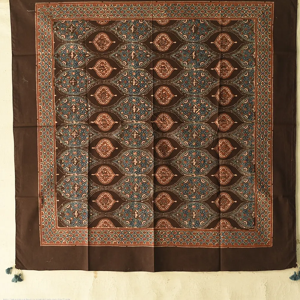 Square Ajrakh cotton scarf featuring hand-block printed teardrop motifs in natural indigo and madder red on a deep brown base.