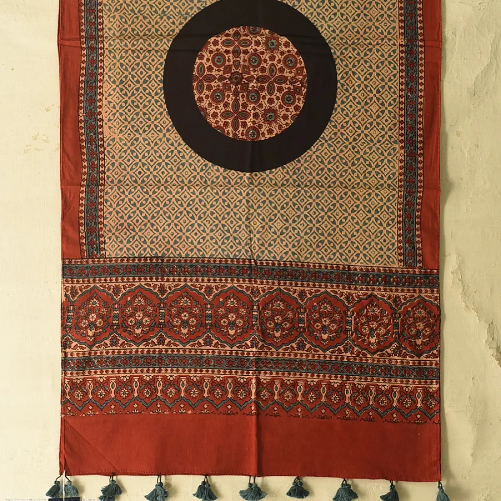 terracotta madder red ajrakh cotton stole hand block printed large circular chand moon medallion geometric lattice body ornate floral mihrab border traditional artisanal scarf sustainable fashion natural dyed with tassels