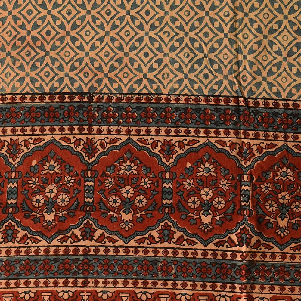 terracotta madder red ajrakh cotton stole hand block printed large circular chand moon medallion geometric lattice body ornate floral mihrab border traditional artisanal scarf sustainable fashion natural dyed with tassels