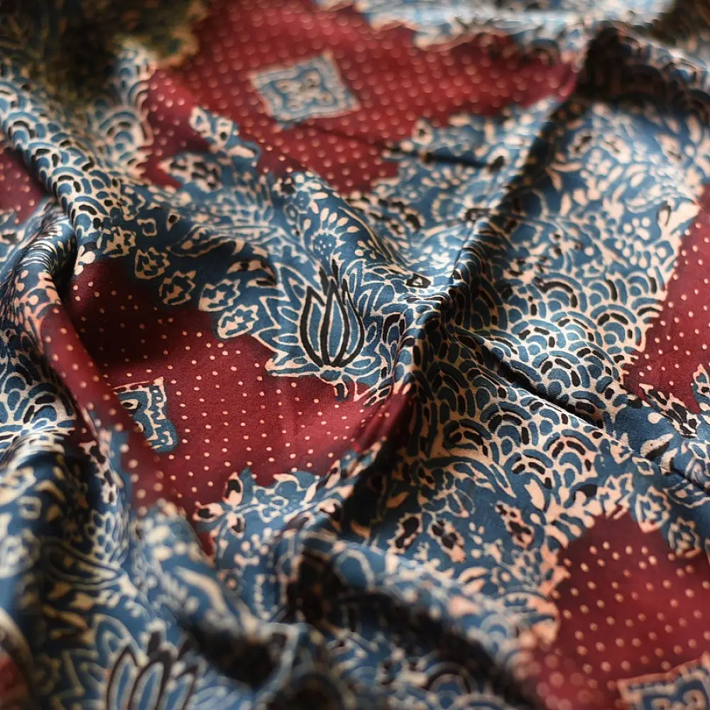 deep indigo blue madder red ajrakh modal silk dupatta hand block printed patchwork body chand moon medallion motifs ornate petal pallu traditional mihrab arched detail wedding festive wear sustainable luxury natural dyed with tassels