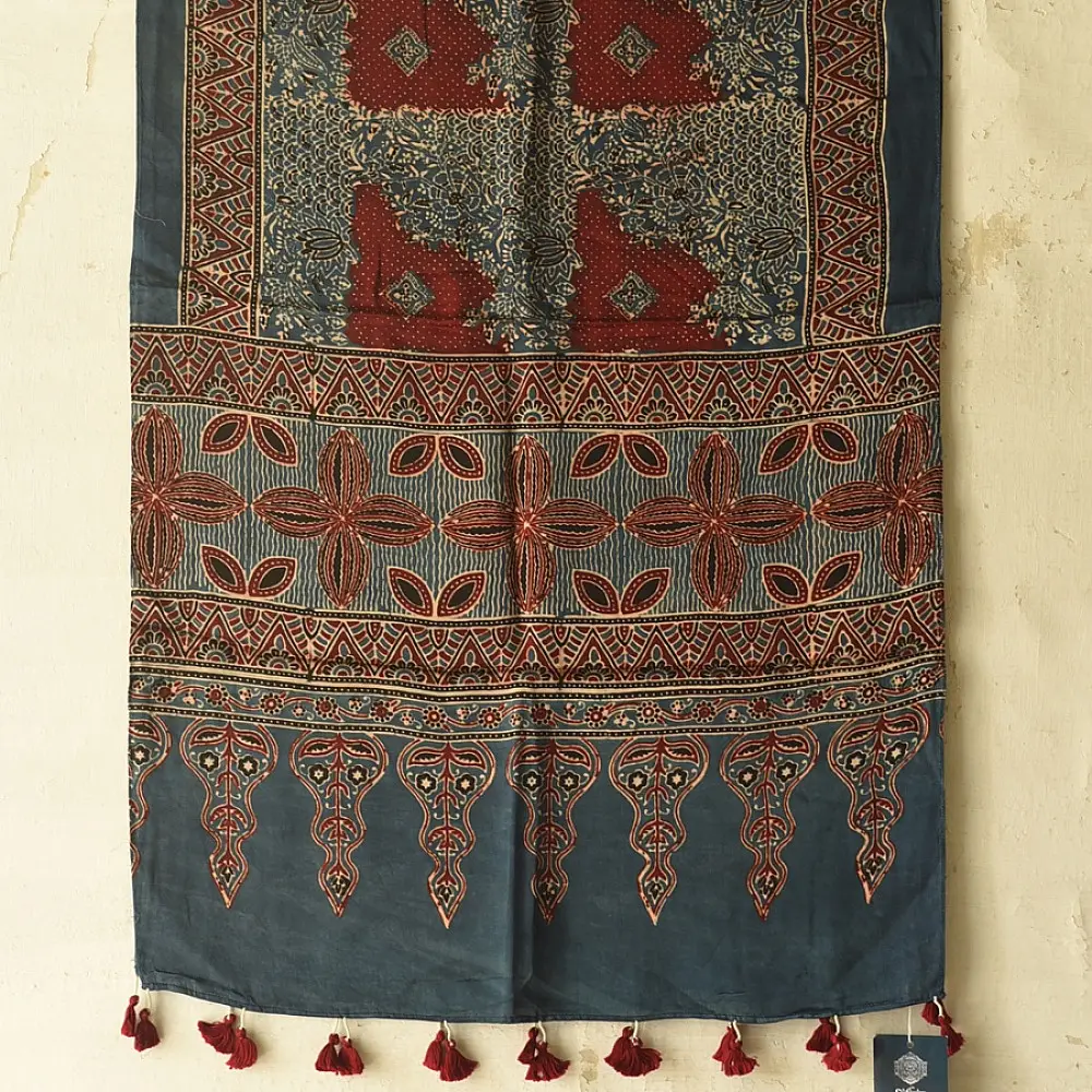 deep indigo blue madder red ajrakh modal silk dupatta hand block printed patchwork body chand moon medallion motifs ornate petal pallu traditional mihrab arched detail wedding festive wear sustainable luxury natural dyed with tassels