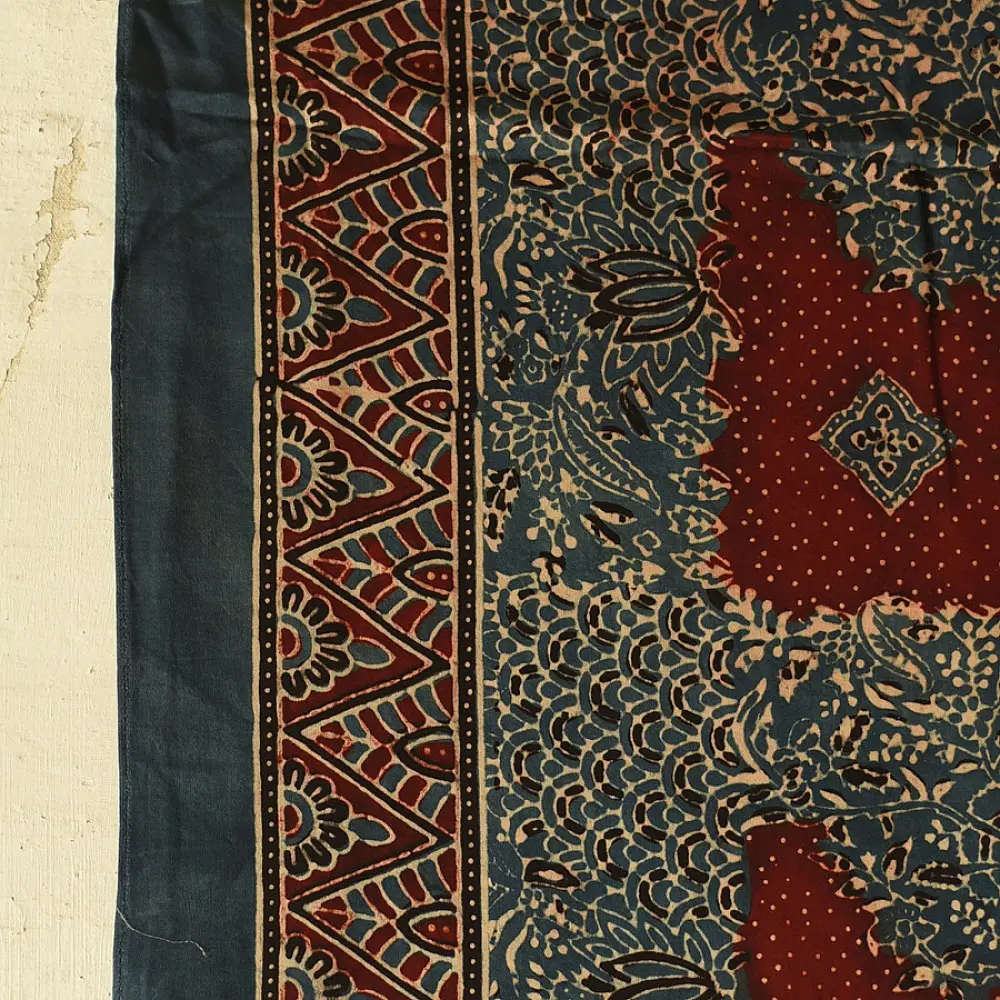 deep indigo blue madder red ajrakh modal silk dupatta hand block printed patchwork body chand moon medallion motifs ornate petal pallu traditional mihrab arched detail wedding festive wear sustainable luxury natural dyed with tassels