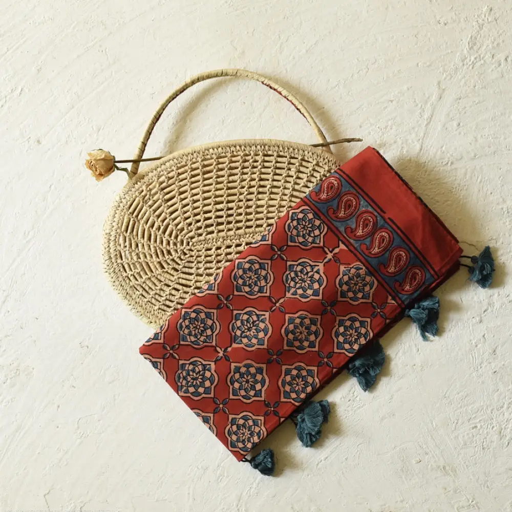 madder red indigo blue ajrakh cotton stole hand block printed floral medallion jaal body traditional paisley kalka border ornate mihrab arched detail artisanal scarf sustainable fashion natural dyed with tassels