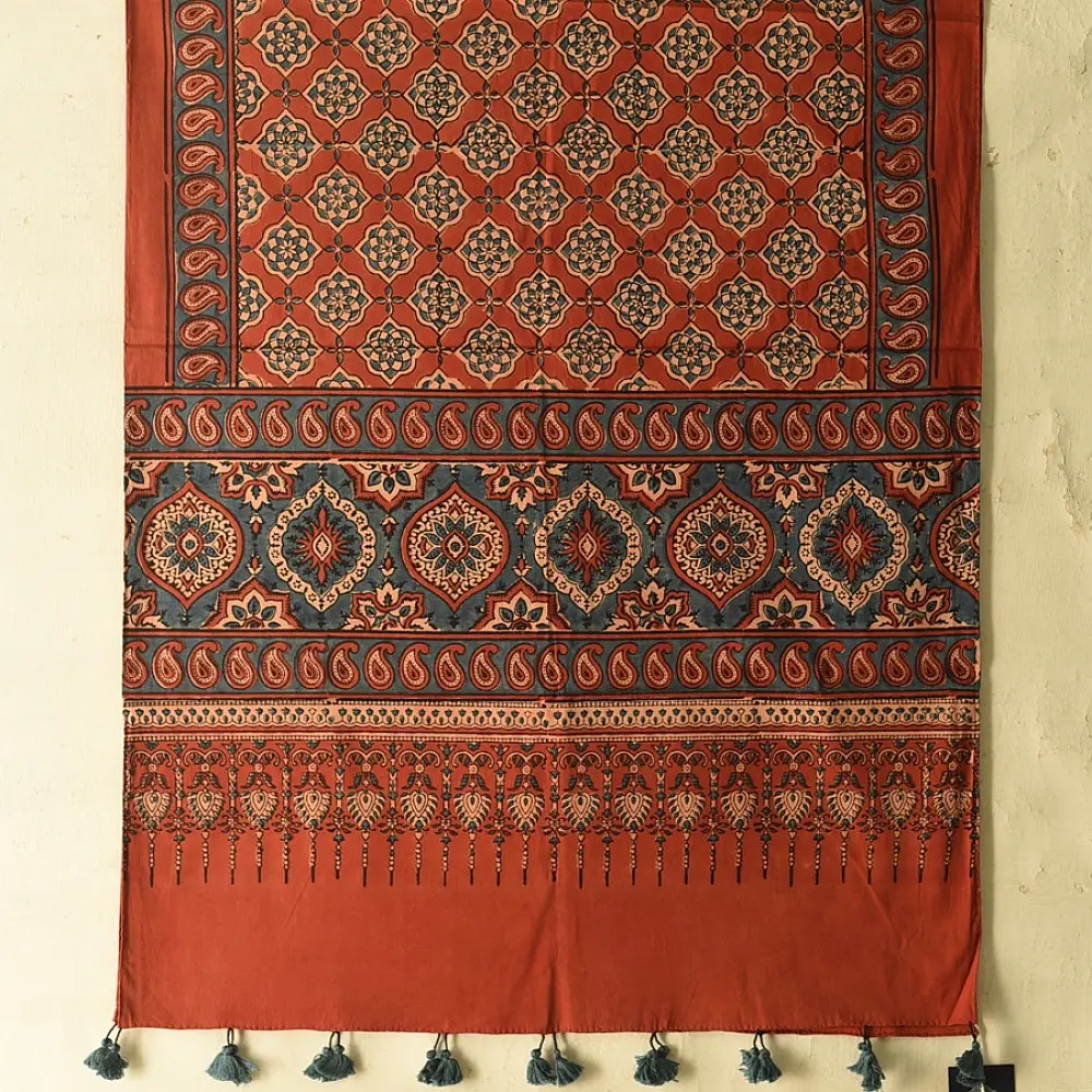 madder red indigo blue ajrakh cotton stole hand block printed floral medallion jaal body traditional paisley kalka border ornate mihrab arched detail artisanal scarf sustainable fashion natural dyed with tassels