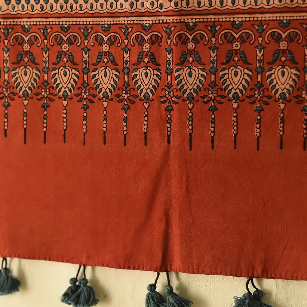 madder red indigo blue ajrakh cotton stole hand block printed floral medallion jaal body traditional paisley kalka border ornate mihrab arched detail artisanal scarf sustainable fashion natural dyed with tassels